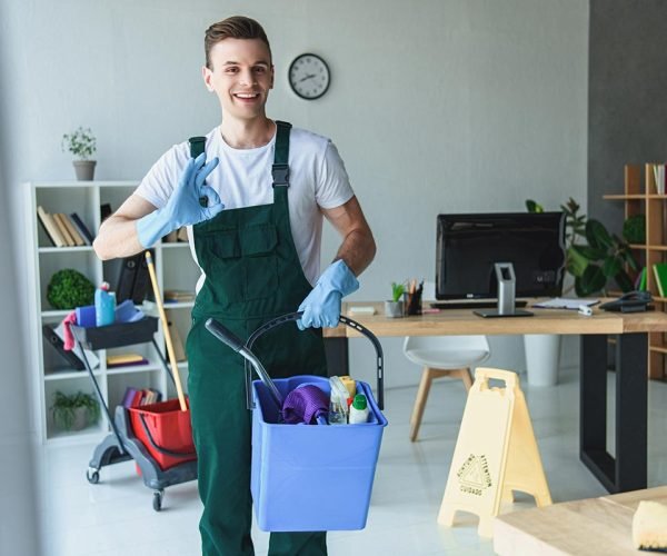 handsome-smiling-young-cleaner-holding-bucket-with-resize.jpg